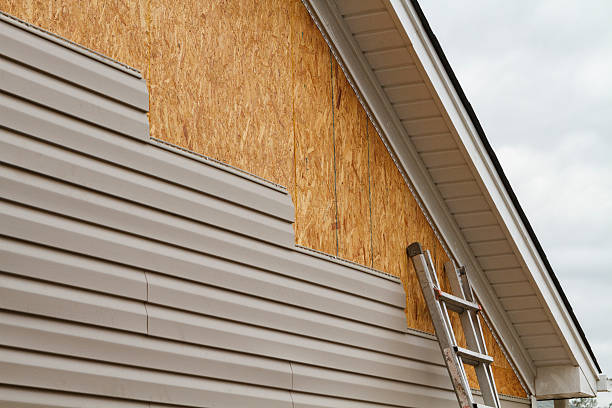 Professional Siding Installation technician working in Waltham, MA